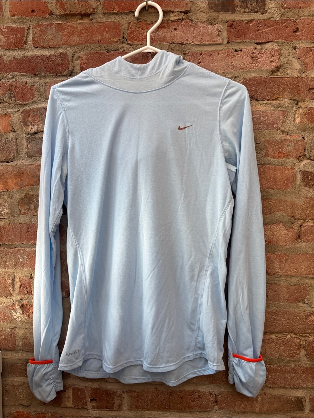 NWOT Nike running Light Blue Long-Sleeve Performance Top with orange Accent